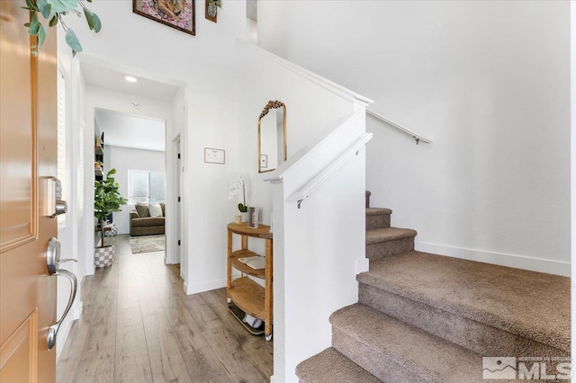 entryway with light hardwood / wood-style flooring