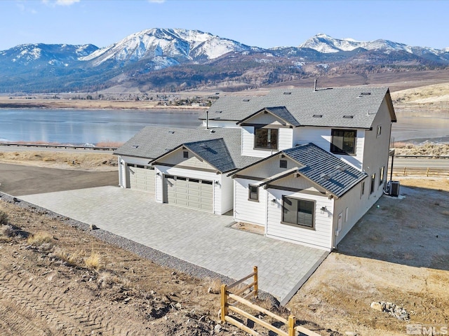 aerial view with a water and mountain view