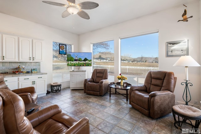 living room with ceiling fan