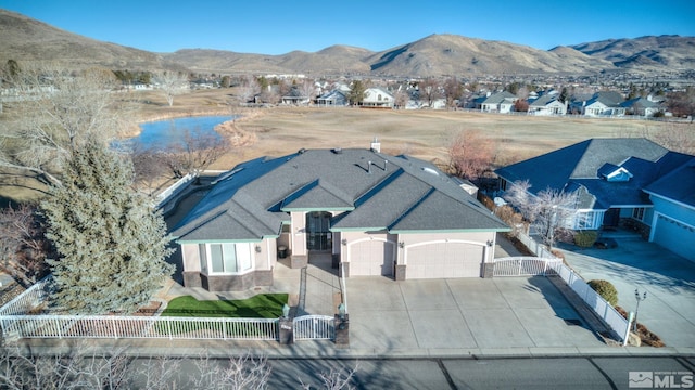 drone / aerial view featuring a mountain view