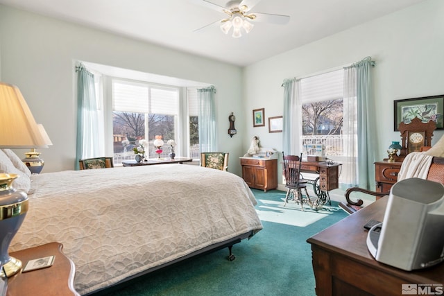 carpeted bedroom featuring ceiling fan