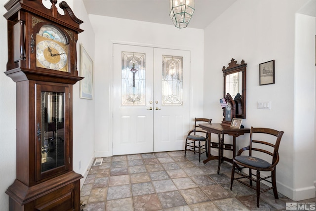 entryway featuring a healthy amount of sunlight and french doors