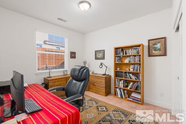 home office with light carpet