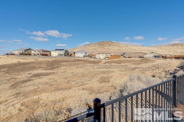 view of yard with a mountain view