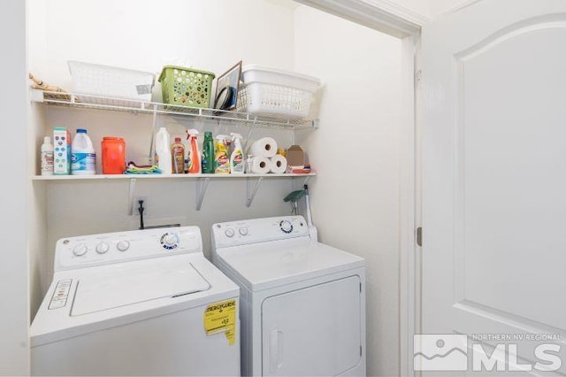 laundry room with separate washer and dryer