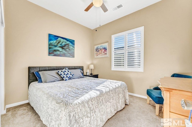 bedroom featuring ceiling fan and light colored carpet