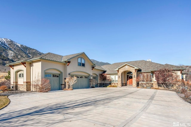 view of front of property with a mountain view