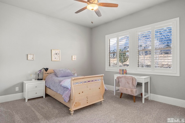 bedroom with ceiling fan and carpet