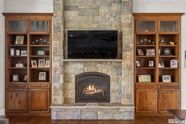 living room featuring a fireplace and hardwood / wood-style flooring