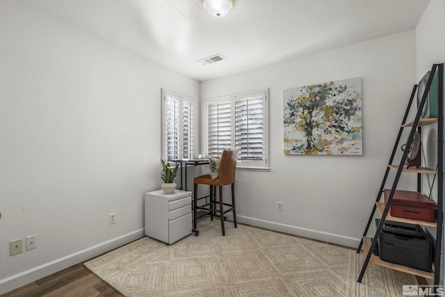 home office featuring light wood-type flooring