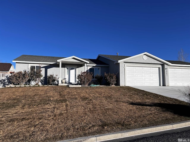 single story home with a garage