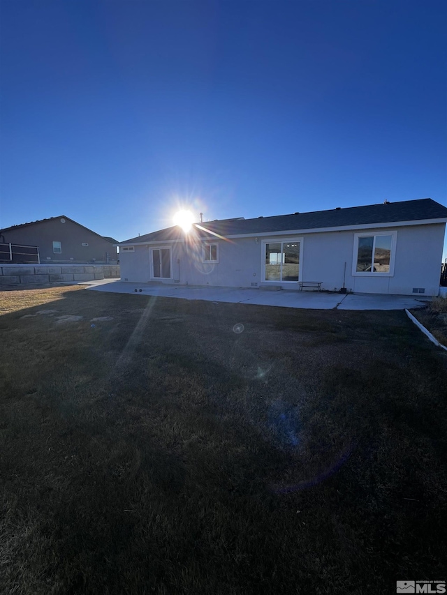 view of front facade with a patio area