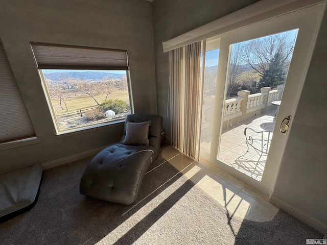 living area featuring tile patterned flooring