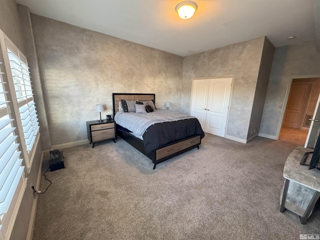 carpeted bedroom featuring a closet