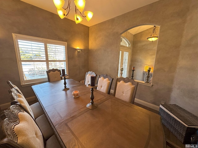 dining area with a notable chandelier