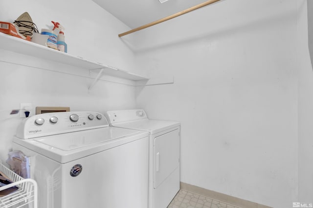 washroom featuring washer and dryer