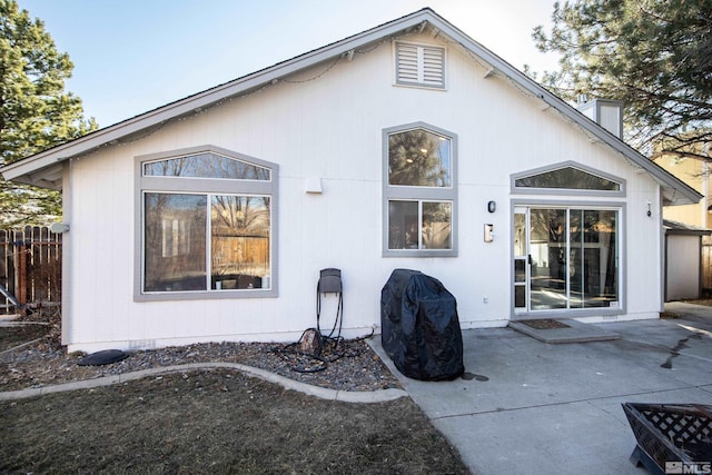 back of house with a patio area