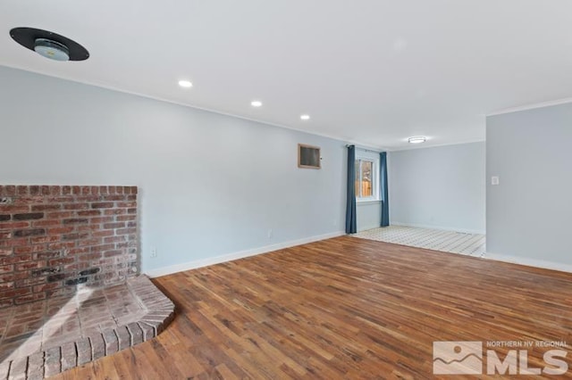 unfurnished living room featuring wood-type flooring