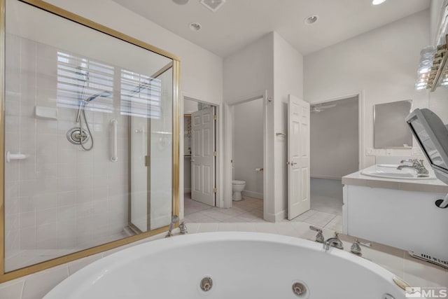 full bathroom with toilet, vanity, and shower with separate bathtub