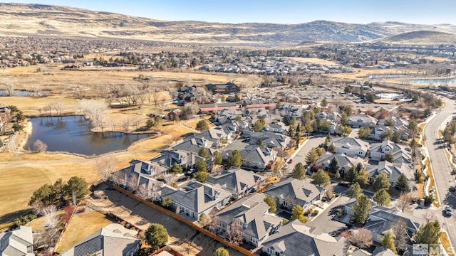 aerial view with a water and mountain view