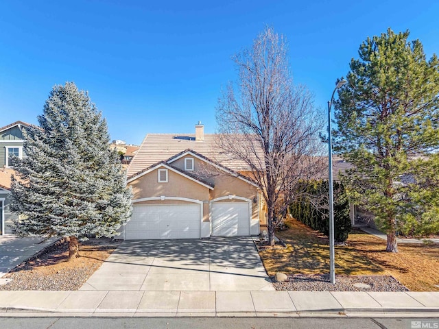 view of front property featuring a garage