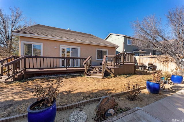 rear view of house with a deck