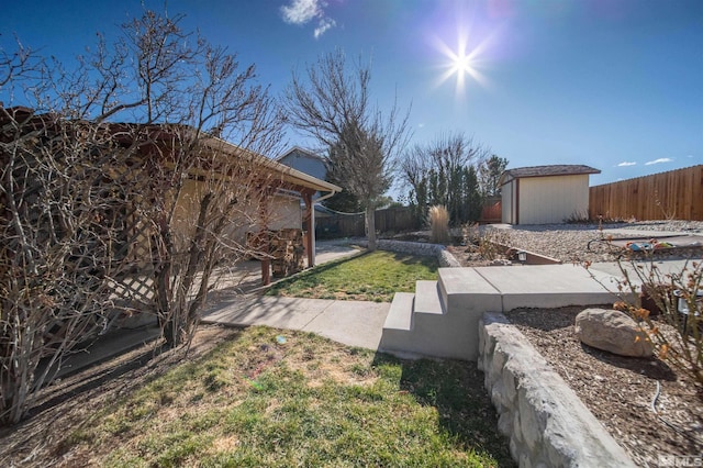 view of yard with a storage shed