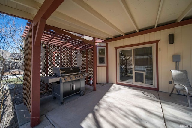 view of patio / terrace with a pergola and grilling area