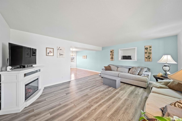 living room with light hardwood / wood-style floors