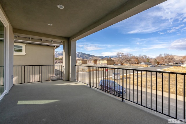 balcony featuring a mountain view