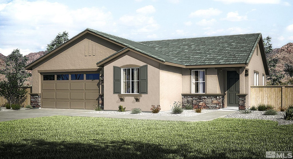 view of front of property featuring a front yard and a garage