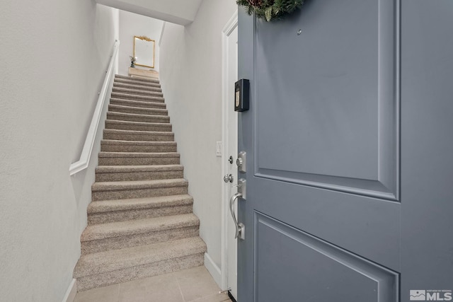 interior space with tile patterned floors