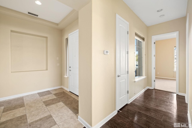 hallway with light wood-type flooring