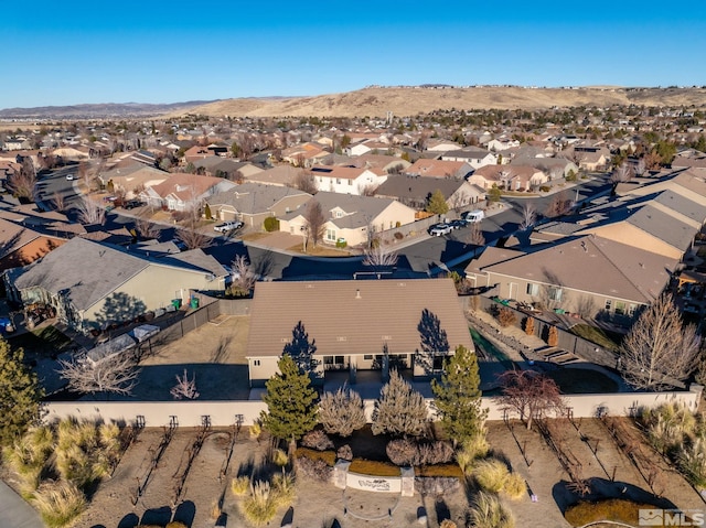 drone / aerial view featuring a mountain view