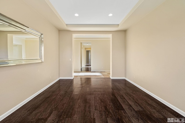 empty room featuring hardwood / wood-style floors