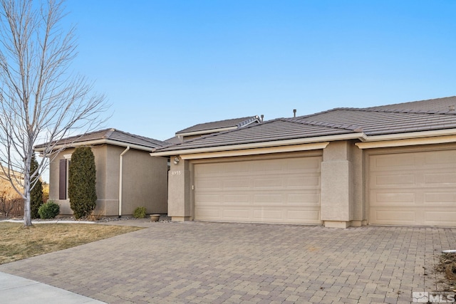 view of front of property with a garage