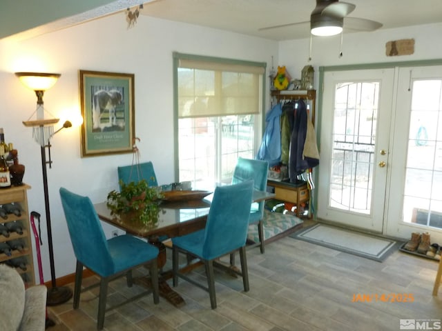 dining area featuring hardwood / wood-style floors and french doors