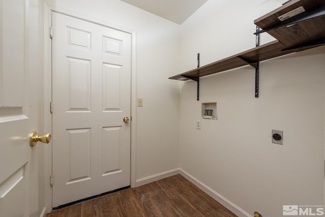 laundry area featuring dark hardwood / wood-style floors, electric dryer hookup, and hookup for a washing machine