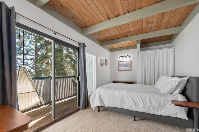 carpeted bedroom with beamed ceiling and wooden ceiling