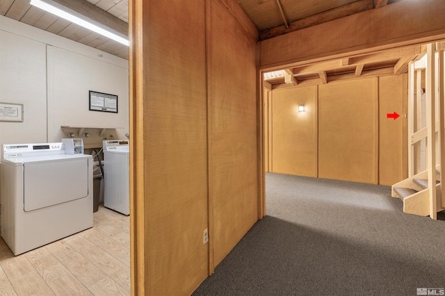 hall with washing machine and dryer and wooden ceiling