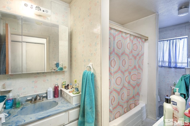 bathroom with vanity and shower / bath combo