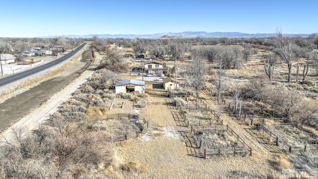 aerial view featuring a mountain view and a rural view