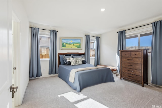 bedroom with carpet, multiple windows, and recessed lighting