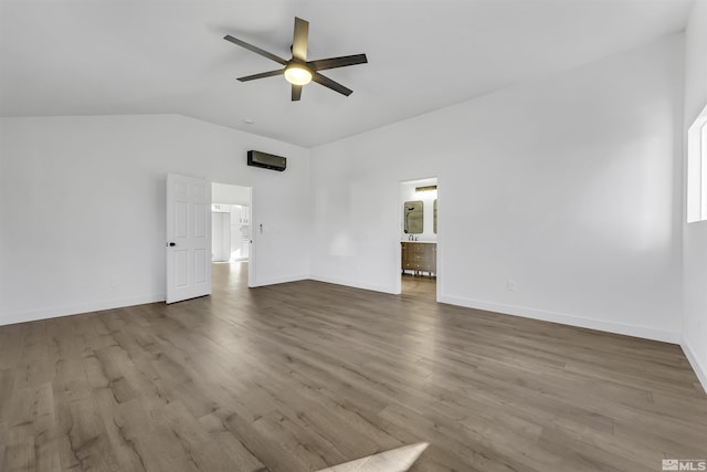 interior space with ceiling fan, lofted ceiling, and hardwood / wood-style flooring