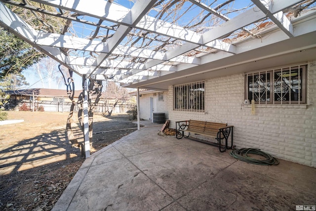 view of patio / terrace featuring a pergola