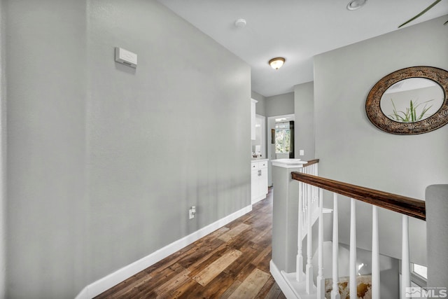 hallway featuring wood-type flooring