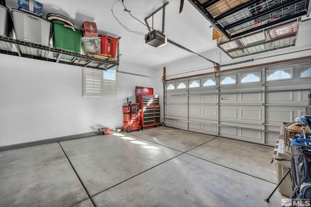 garage featuring a garage door opener