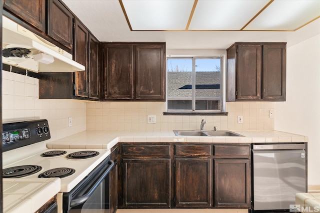 kitchen featuring backsplash, stainless steel dishwasher, electric range, sink, and dark brown cabinetry