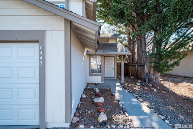 property entrance featuring a garage