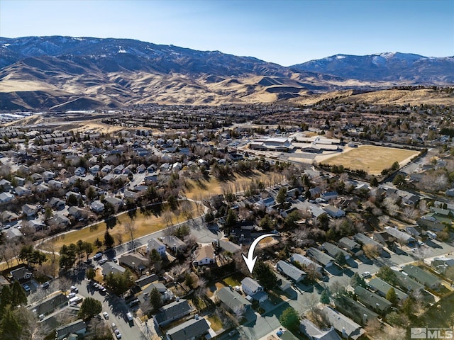 drone / aerial view featuring a mountain view